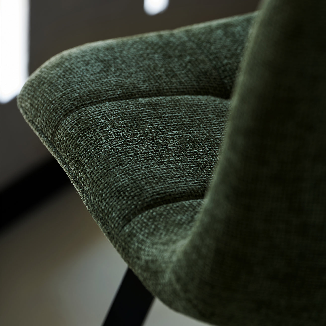 High-quality textured fabric upholstery on Aoife dining chair with double-stitched seams for durability