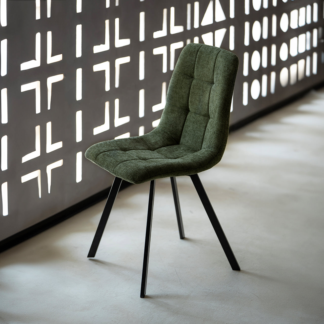 Two Aoife dining chairs neatly stacked showing space-saving design for small homes and apartments