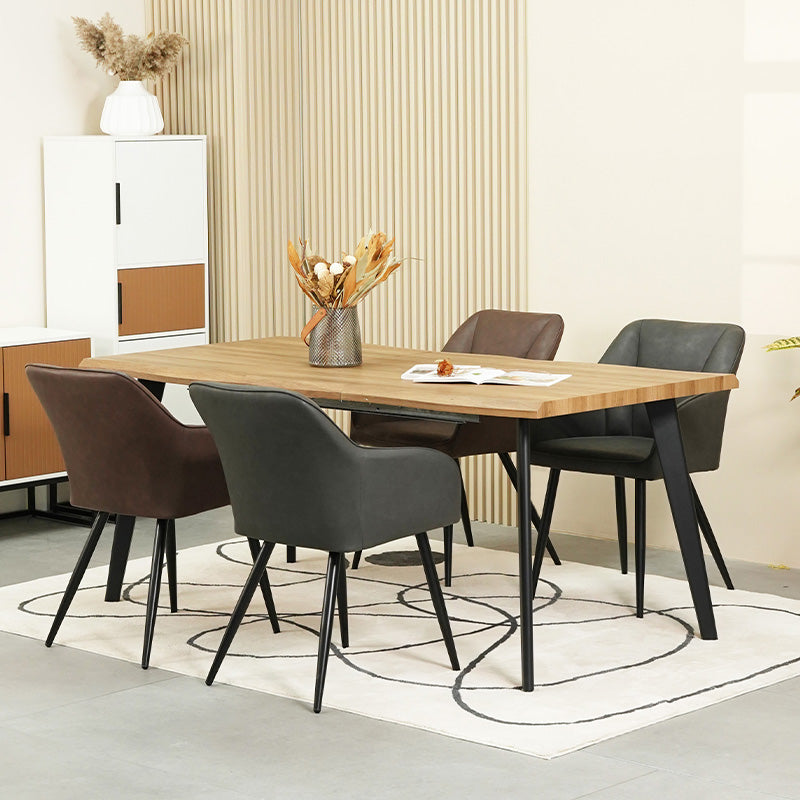 Set aus 4 grauen Sienna Esszimmerstühlen mit weicher Sitzpolsterung und schwarzen Metallbeinen um einen Eichentisch,Nahaufnahme eines Sienna Esszimmerstuhls in Grau mit ergonomischer Rückenlehne und stoffbezogener Sitzfläche